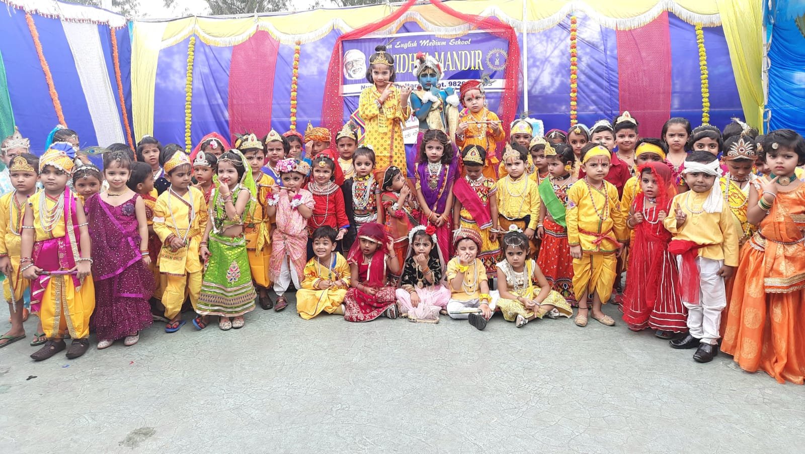 Children brought alive the character of Kanhaiya in the costumes of Radha and Krishna.