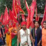 With red flags in their hands and chants of Mother Goddess on their lips, devotees set out to visit Mother Goddess.