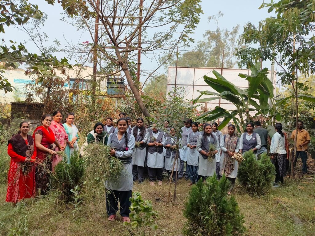 Girls students of MGM College cleaned the medicinal garden.