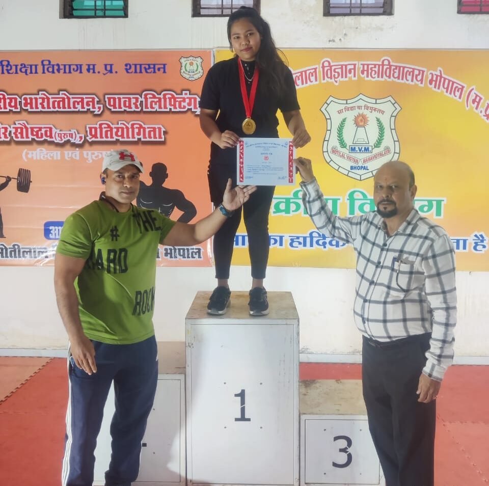 Girls College student Richa Mehra received gold medal in division level power lifting competition.