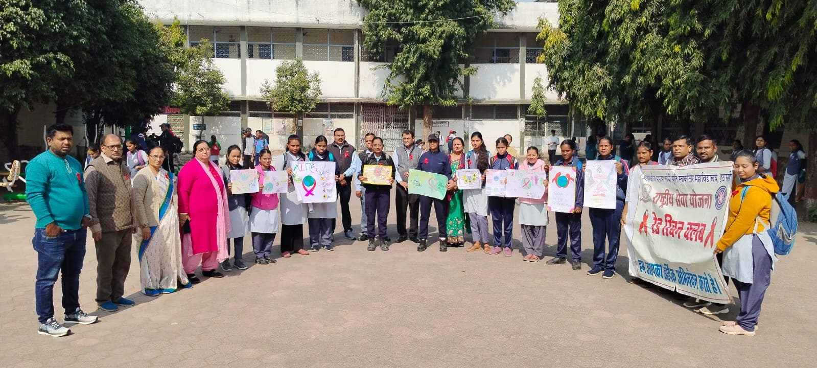 Students gave the message of awareness about AIDS by wearing red ribbon