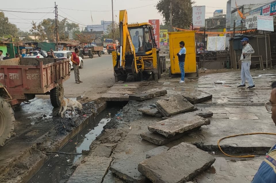 Cleaning of big drain done by JCB on the main road in Ward 11