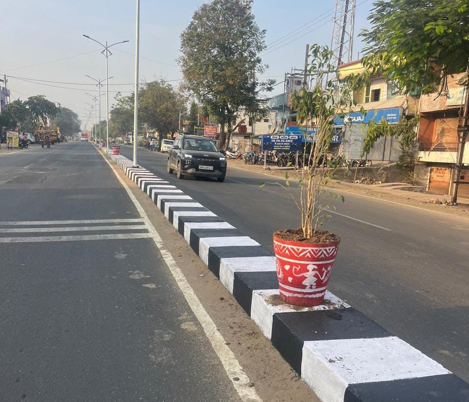 Bhopal: The road looks beautiful with pots placed till the Tirahe double gate.