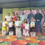 Prizes distributed to the winners of peace posters drawing competition in the school annual function