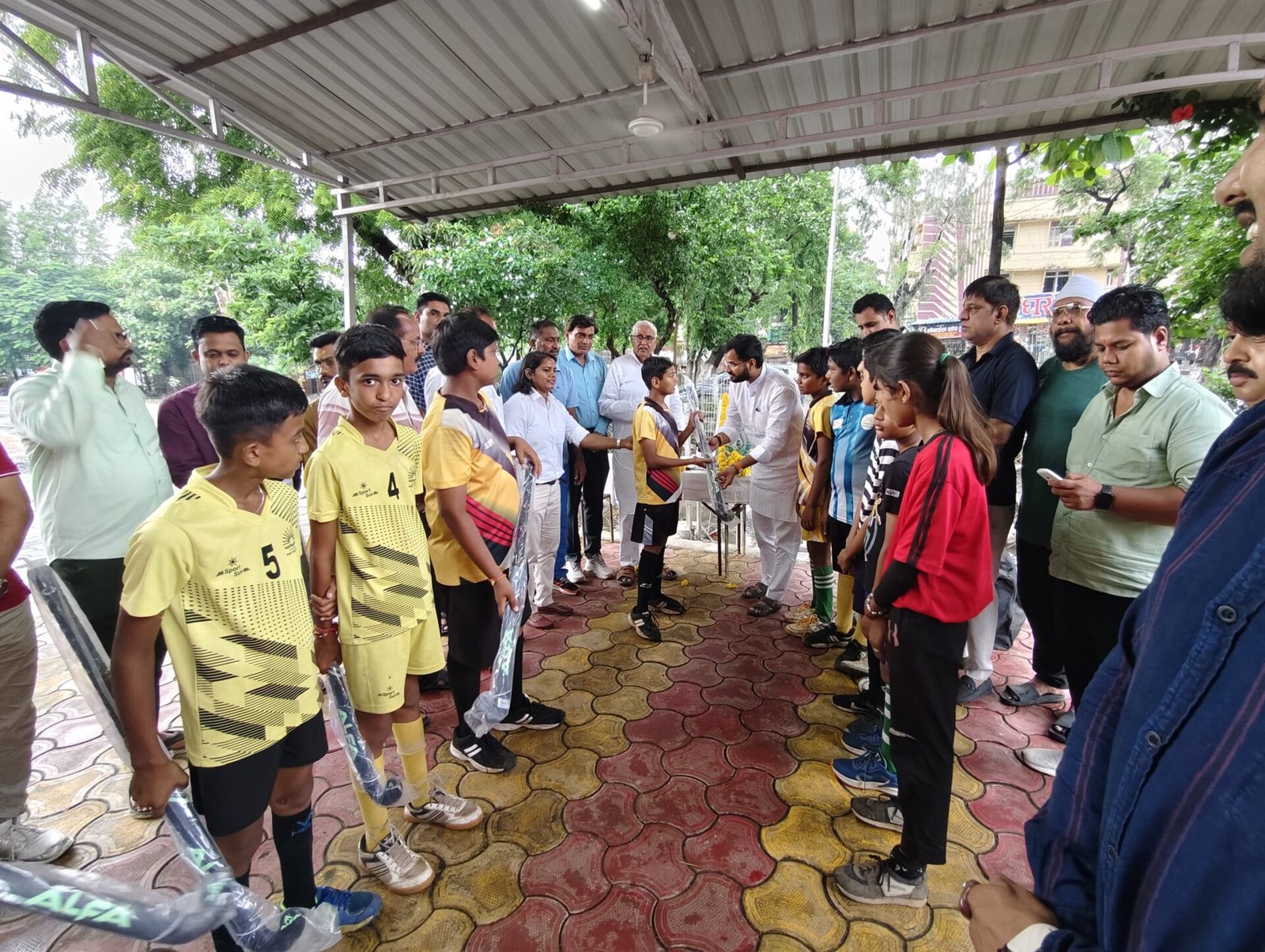Hockey players received sports equipment during National Sports Day celebrations