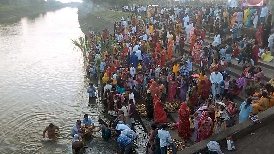 A grand festival of folk faith: A surge of faith on the Pathrota Canal, offerings to the setting sun.