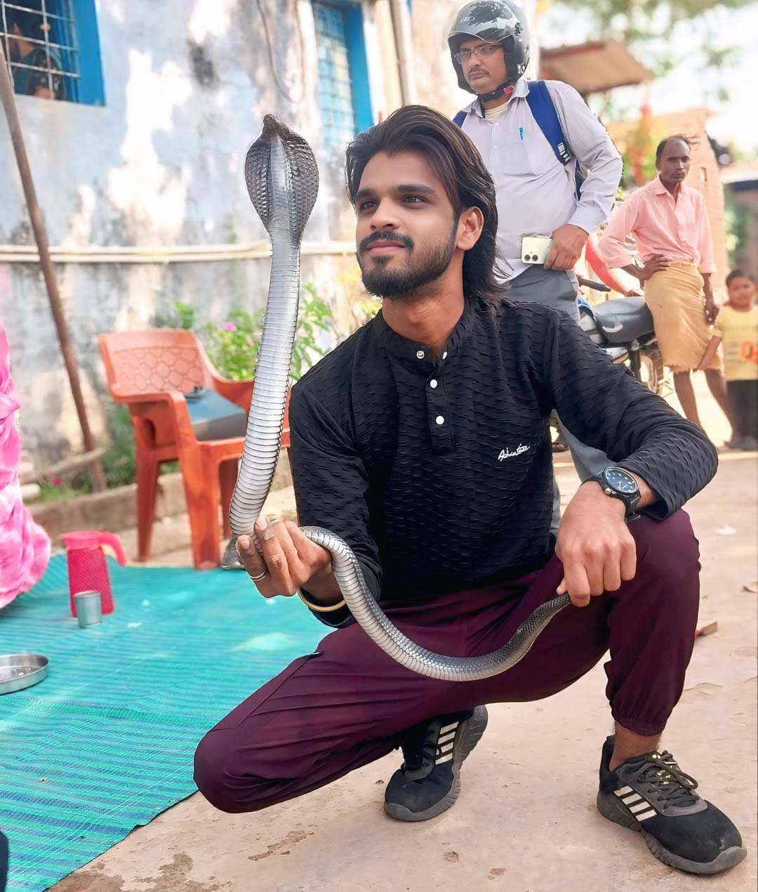 A cobra snake was rescued from a room in a house in Sanwalkheda village and released into a safe forest area by a team of snake friends.