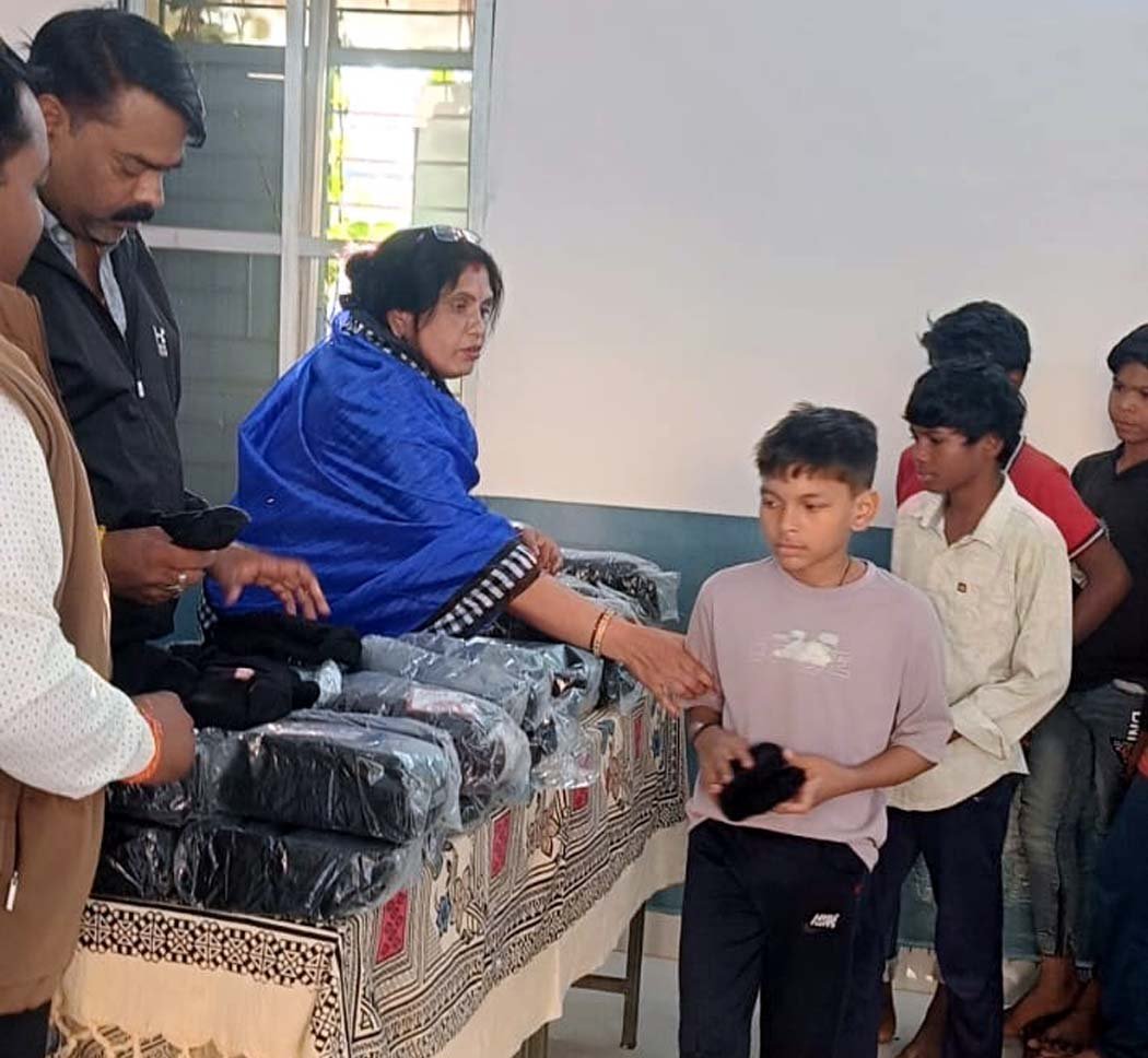 Warm woolen caps distributed to students at residential school in Tawa Nagar, providing relief from the cold.
