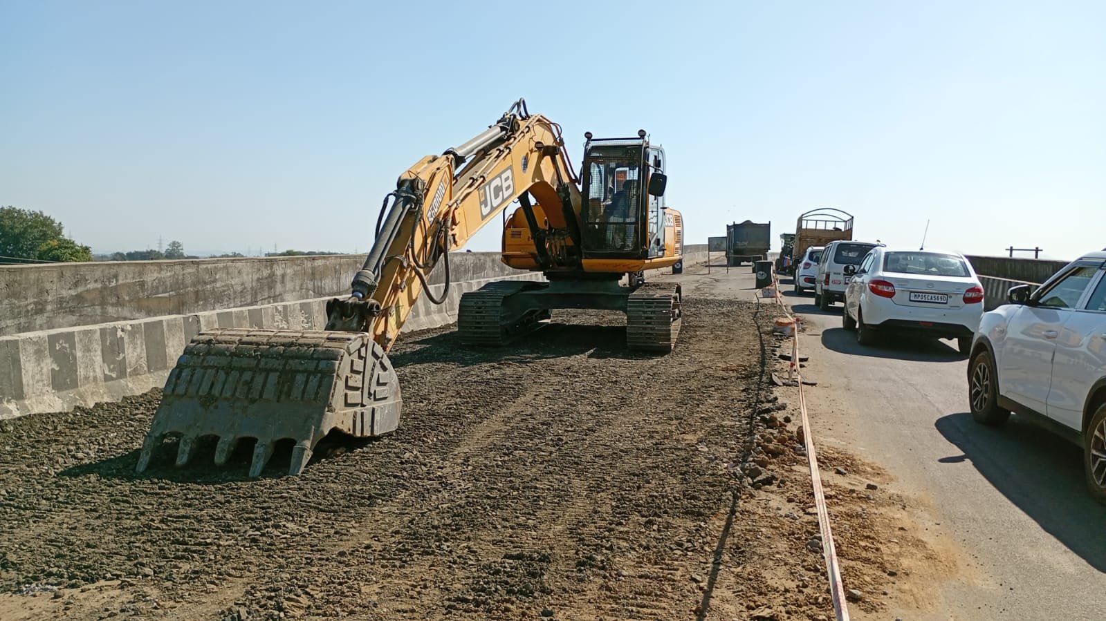 Warehouse and truck owners are worried about the movement of heavy vehicles on Kheda Bridge.