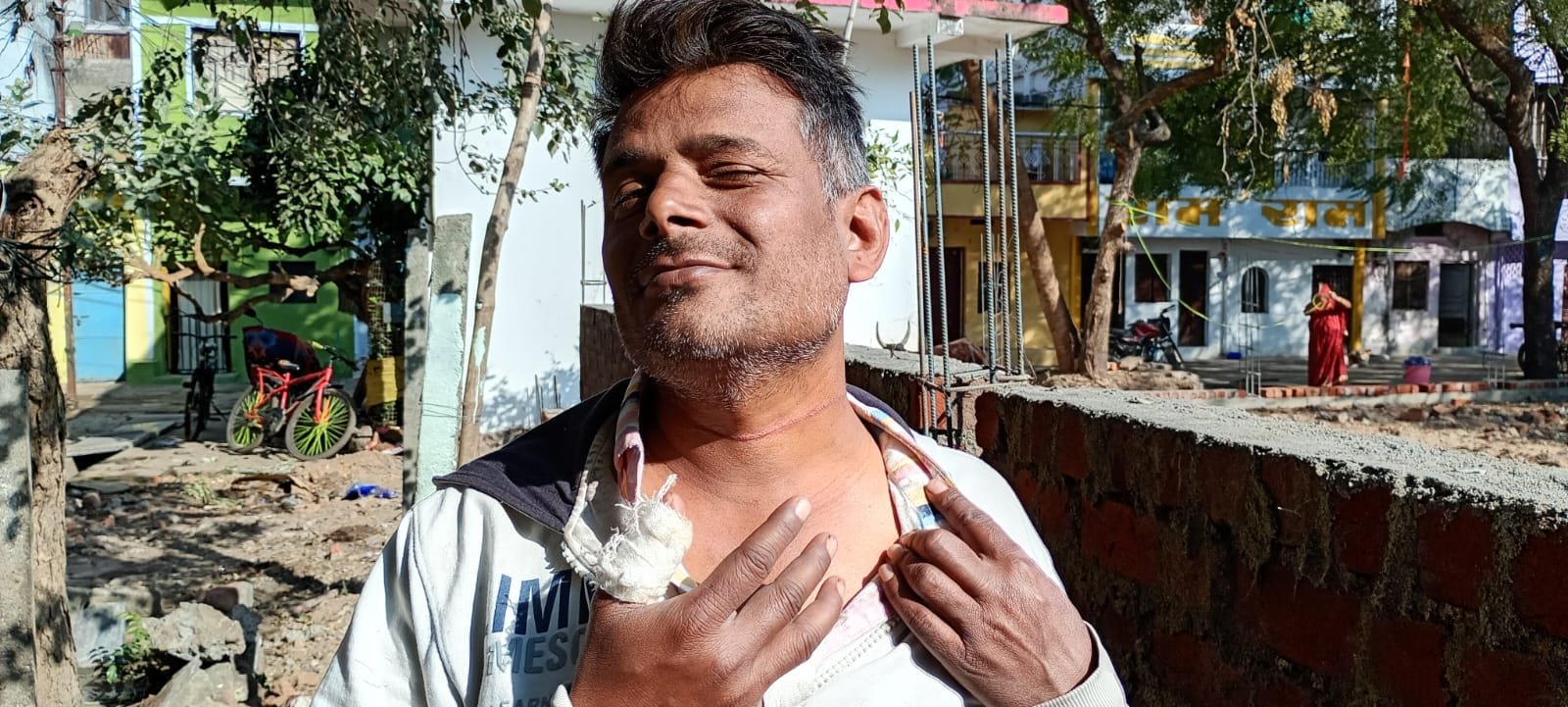 A young man riding a motorcycle sustained minor injuries on his fingers and neck after being struck by Chinese string on an overbridge.