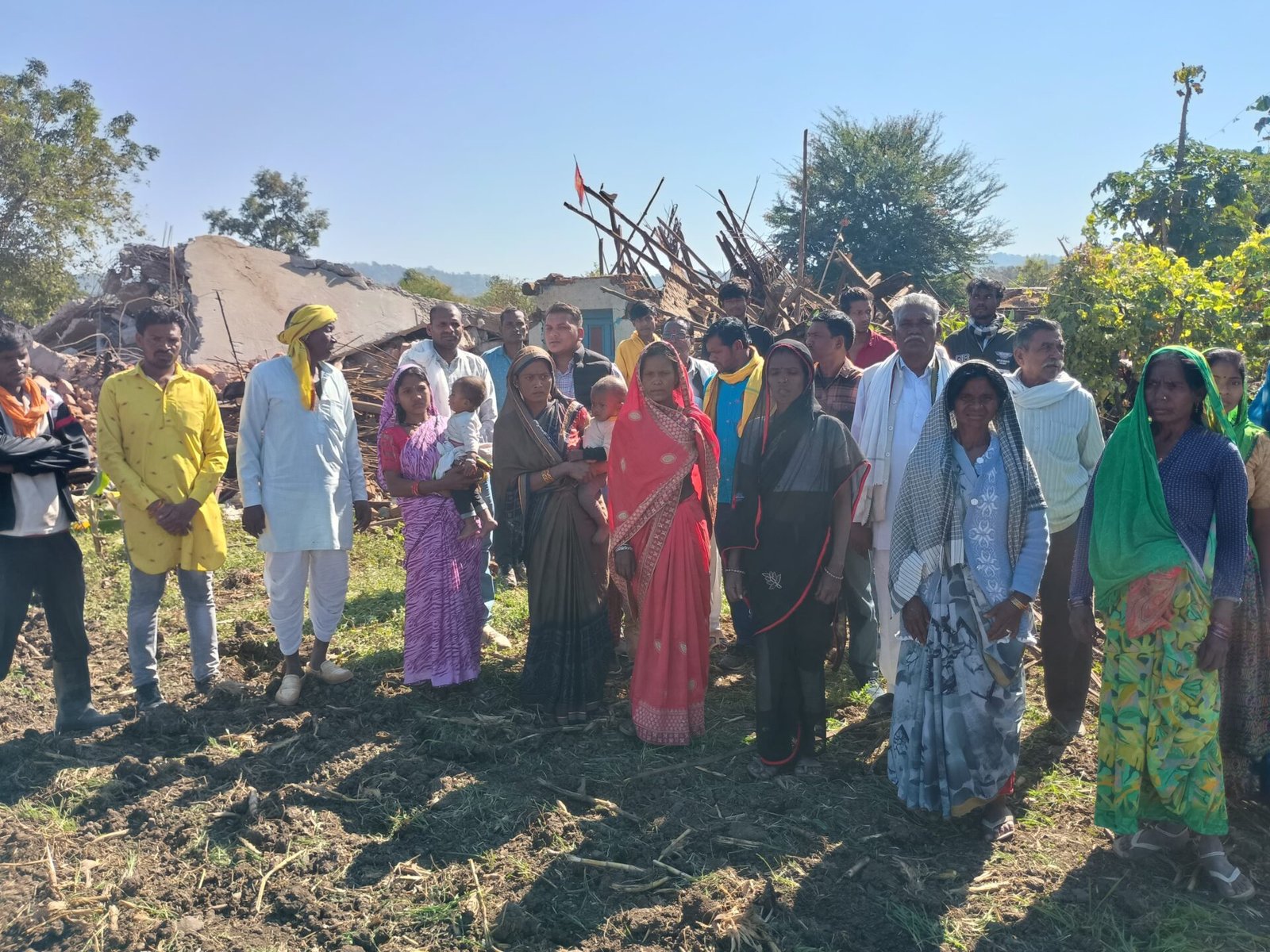 Five poor families' homes demolished on court orders; they spend the night in the open in the bitter cold.