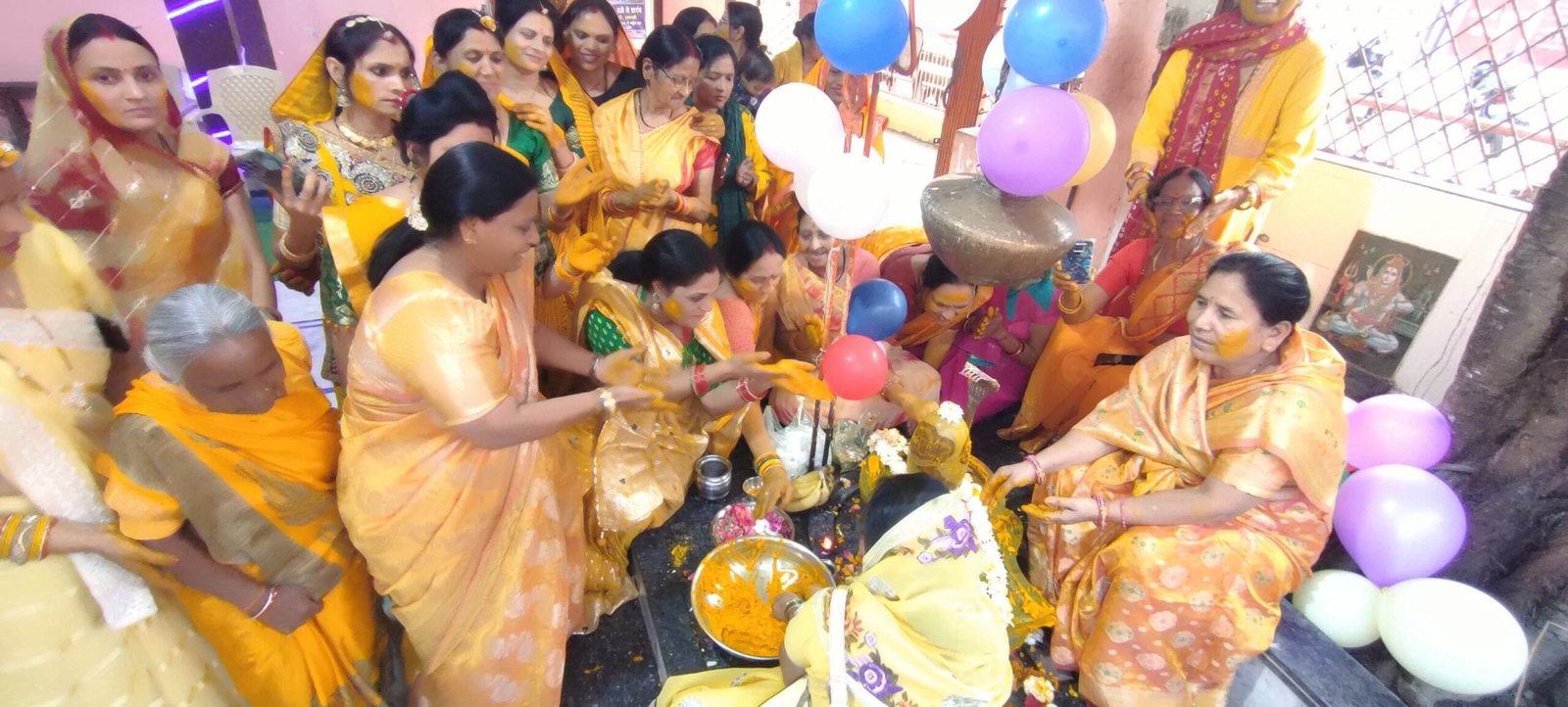 Shri Siddhi Datri Mahila Mandal applied turmeric to Lord Shiva.