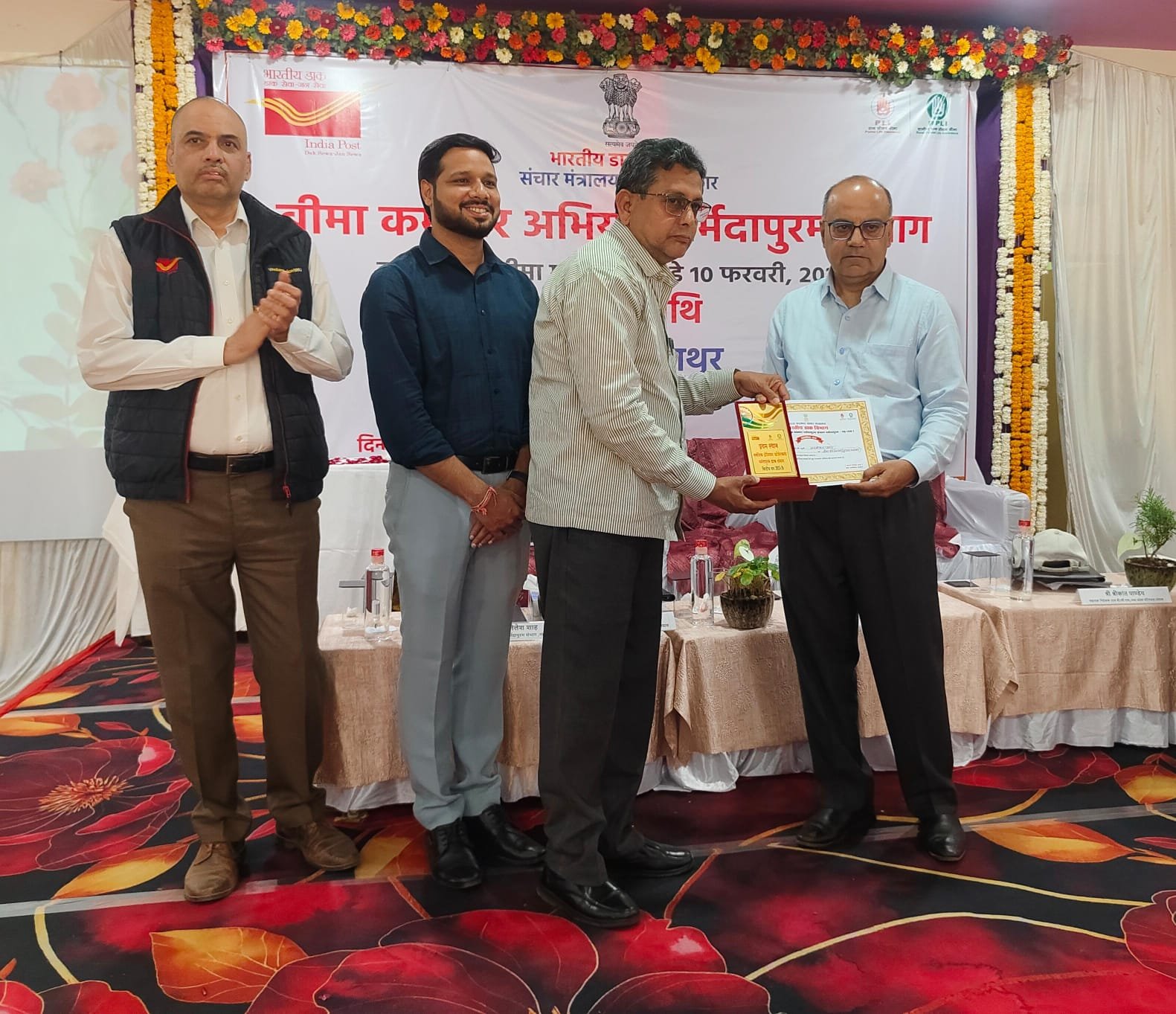 Manmohan Pagare honored for his outstanding work in Postal Life Insurance