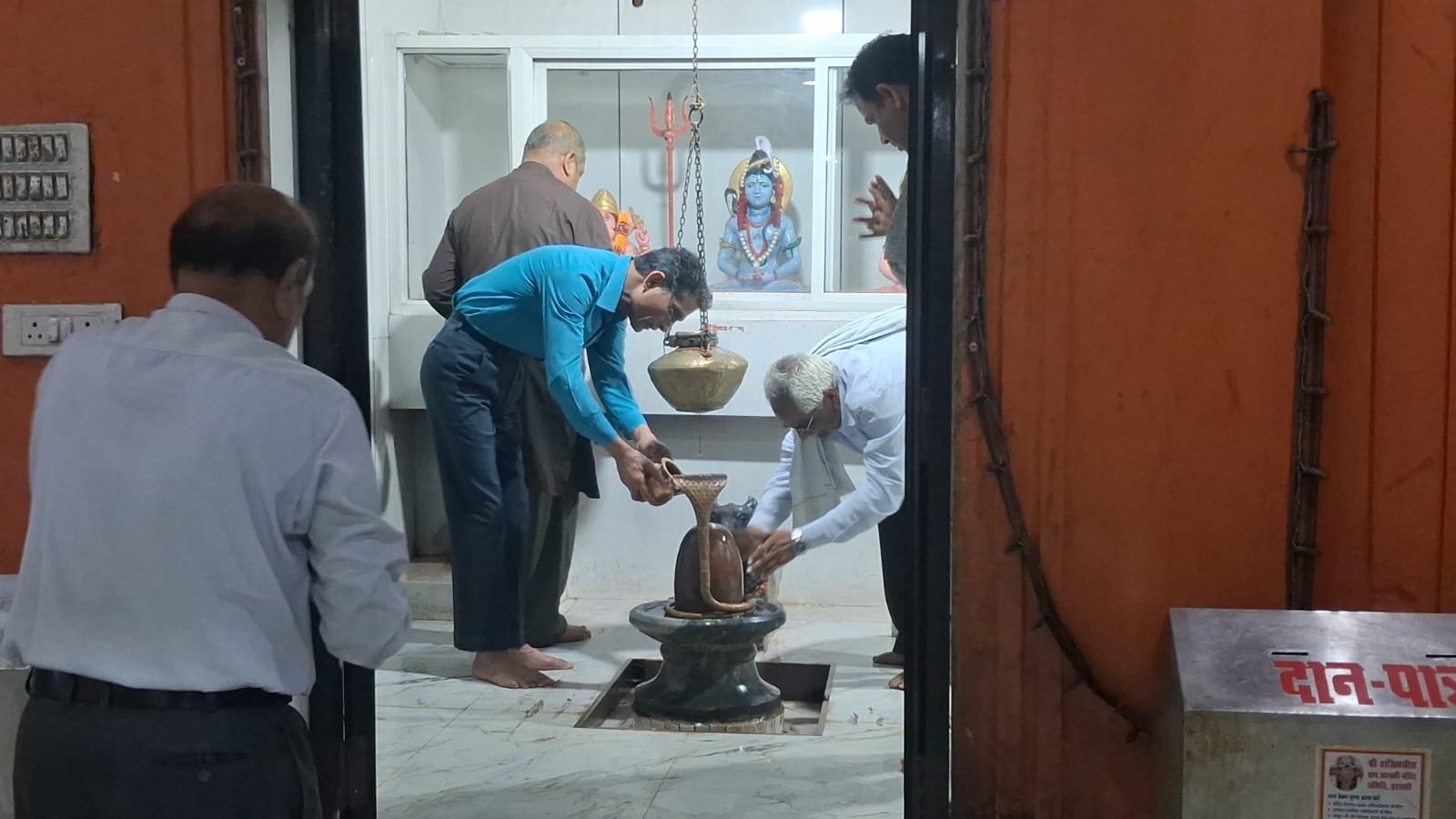 The door to good fortune opened with salvation: Conch shells resounded as the eclipse ended, and temples were purified with Ganga water.