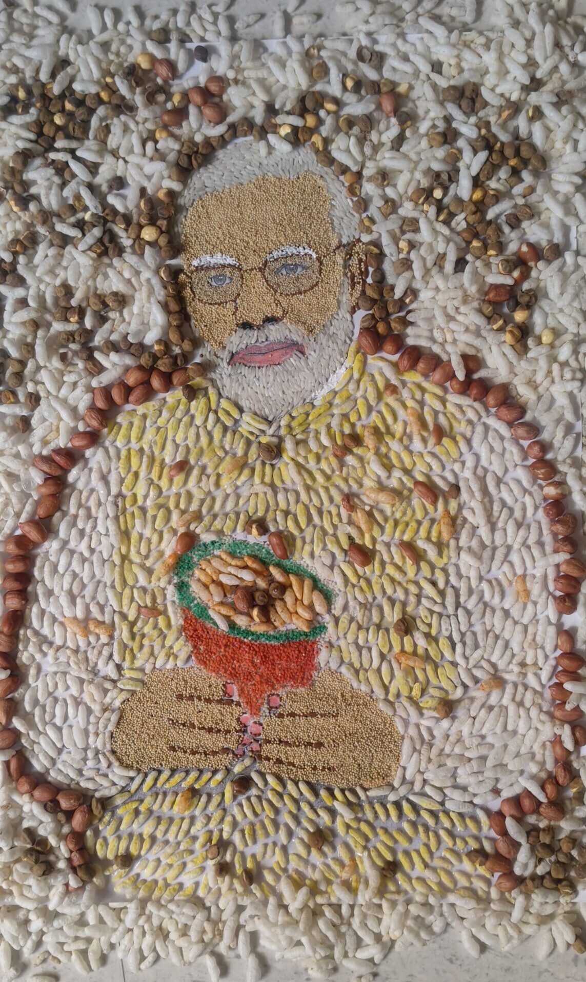A Narmadapuram artist has carved a 'saga of victory' on grains of food, creating an artwork of PM Modi using Jhalmuri.